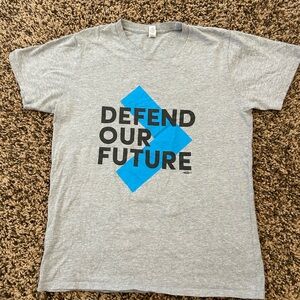 Defend Our Future men’s tee shirt.  Cotton/polyester.